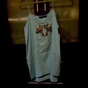 Teal strap strap shirt w embroidered on the front with Tag